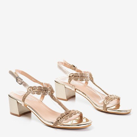 Golden sandals on a low post with cubic zirconia Doremies - Footwear