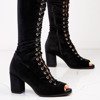 Black boots on a Ramoni post - Footwear