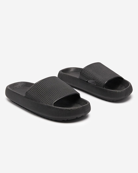 Black rubber slippers with Torika embossing - Footwear