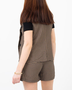 Black women's suit with a brown checked pattern - Clothing