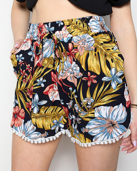 Patterned black and yellow women's shorts - Clothing