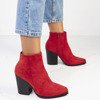 Red boots on a Shepherd post - Footwear