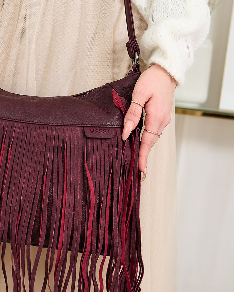 Royalfashion Large women's handbag with tassels in burgundy
