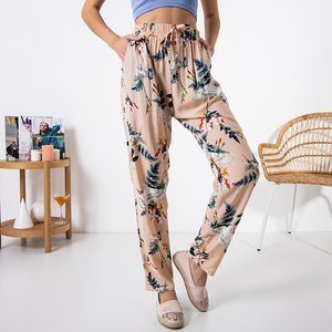 Women's beige pants with a floral pattern - Clothing